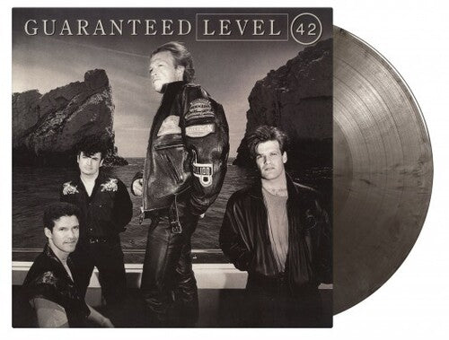 Level 42: Guaranteed - Limited Expanded, 180-Gram Silver & Black Marble Colored Vinyl with Bonus Tracks - VINYL LP "VINYLBADGES"